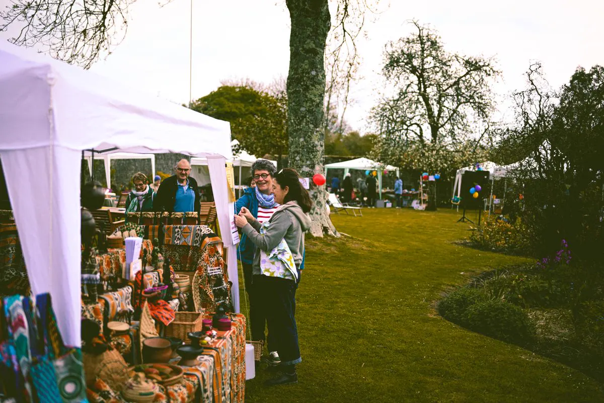 Stalls and gazebos at a garden fete